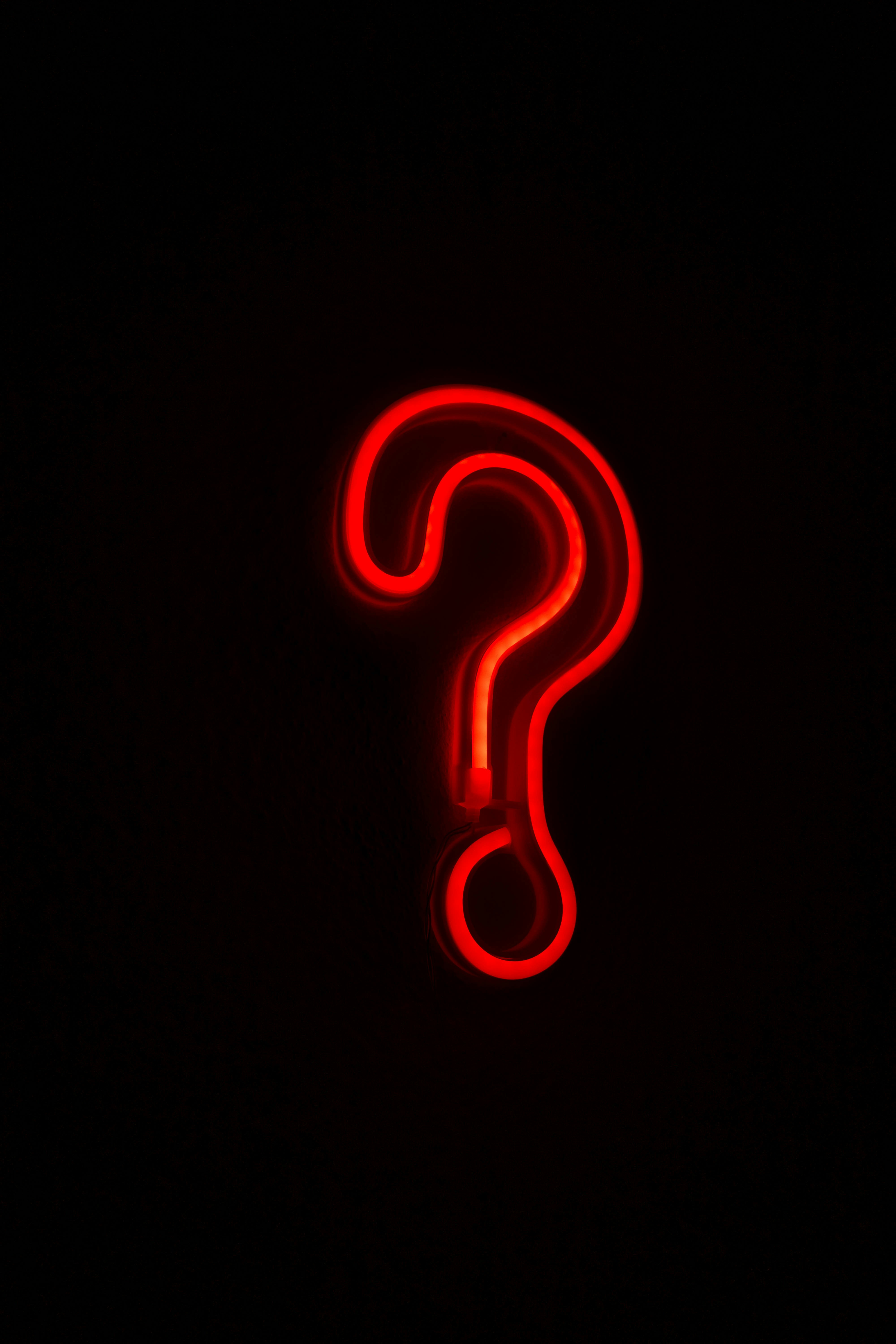 red letter b on black background